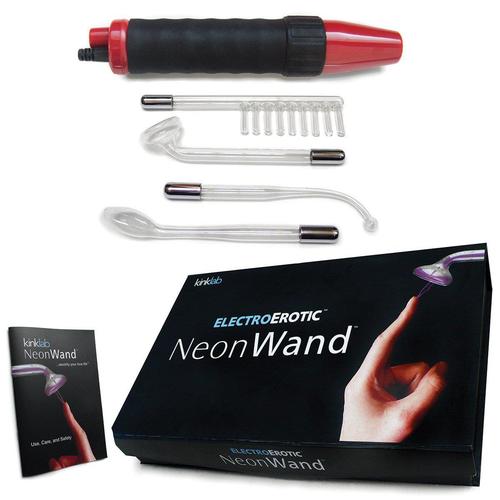 electrostimulation toy neon wand with box and all the components laid out
